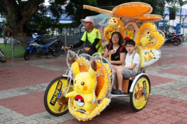 The very colorful bicycle taxis are typical of Malacca.