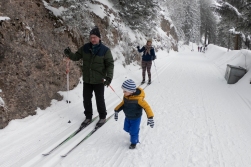 Going skiing with The Grandson roaming free. The road past our house was once upon a time built as a railway line. The tracks are long gone, but the road remains and is used for hiking in the summer and skiing in the wintertime.